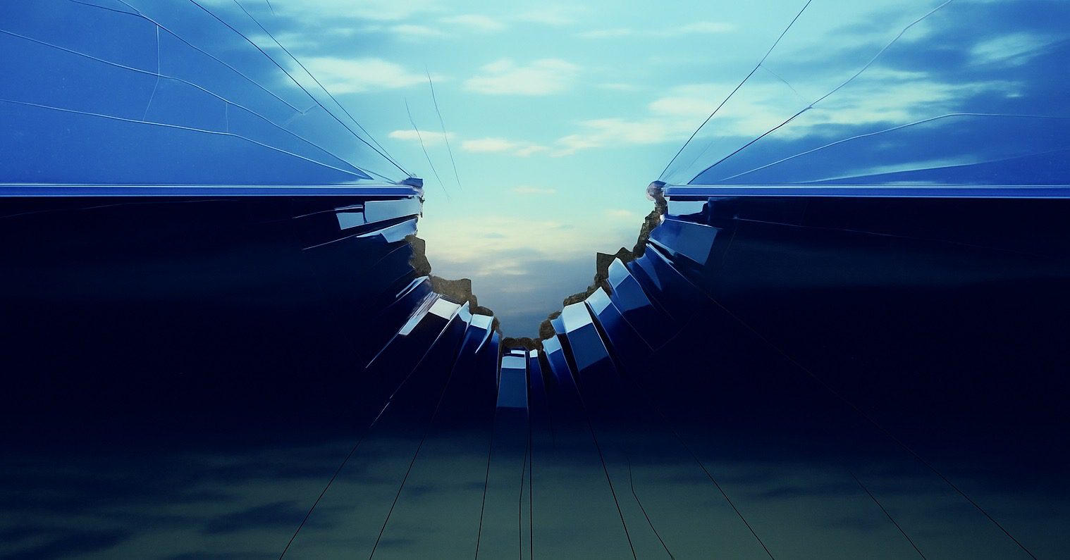 A glass wall has shattered, and clouds are parting, revealing a way out of the darkness and into a gorgeous azure sky.