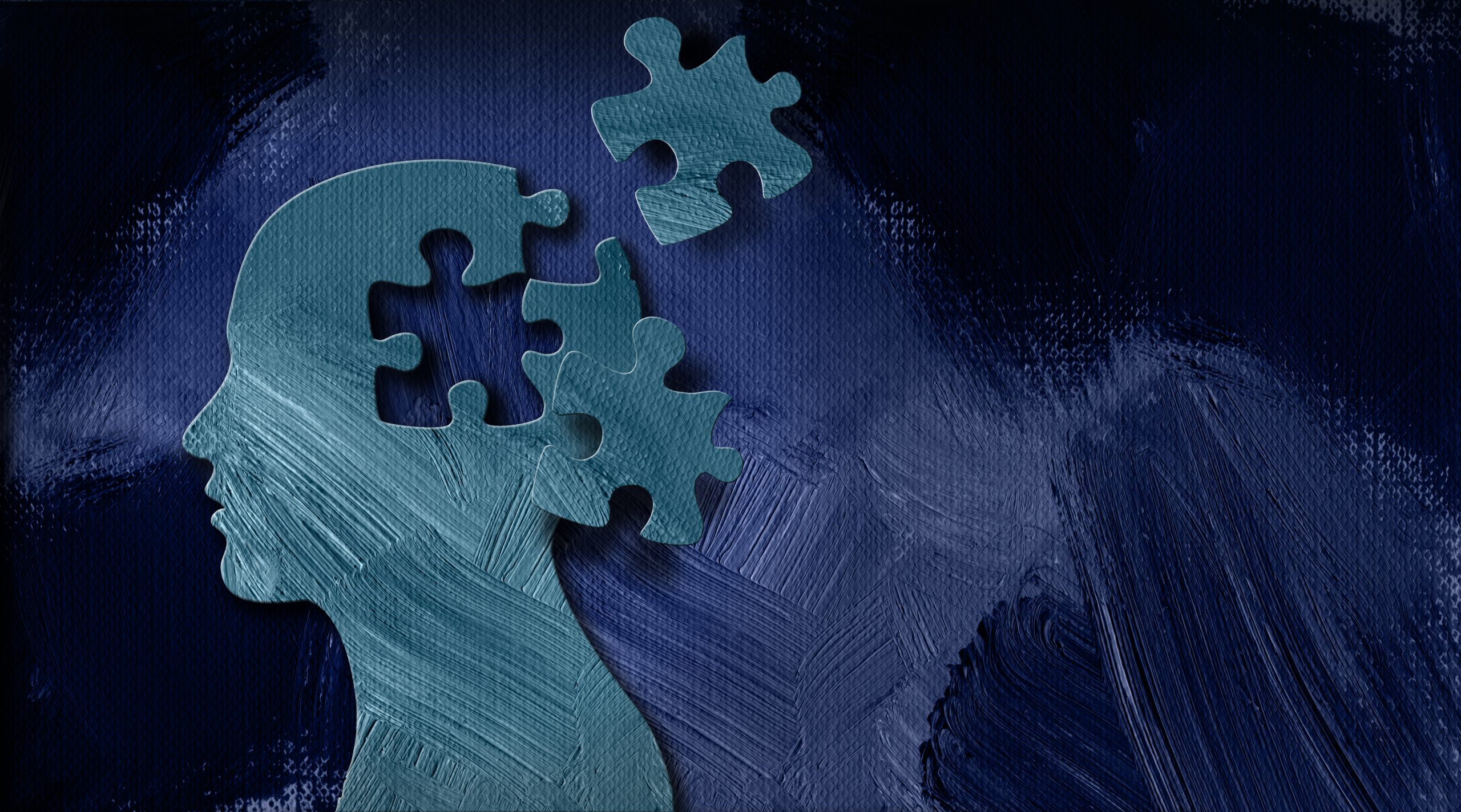 Illustrated silhouette of a human head in profile with puzzle pieces breaking apart from the mind, set against a dark blue painted background — representing the disorientation of persistent depression.